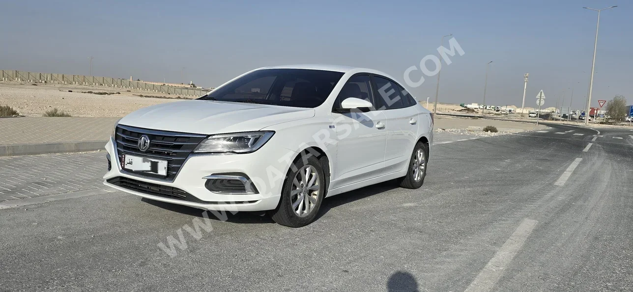 MG  5  2022  Automatic  52,000 Km  4 Cylinder  Rear Wheel Drive (RWD)  Sedan  White  With Warranty