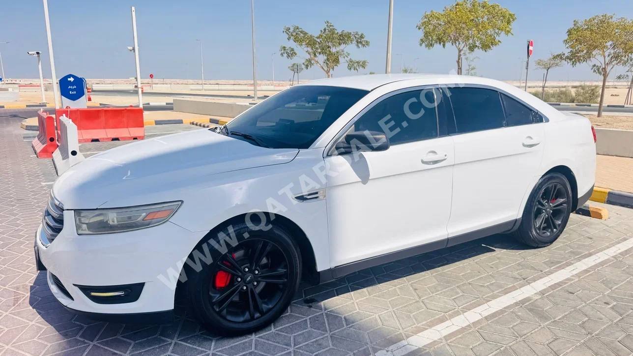 Ford  Taurus  Limited  2014  Automatic  170,000 Km  6 Cylinder  Front Wheel Drive (FWD)  Sedan  White