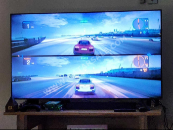 Television (TV) Samsung  - 55 Inch  - 4K or UHD  - Smart TV  - With Table