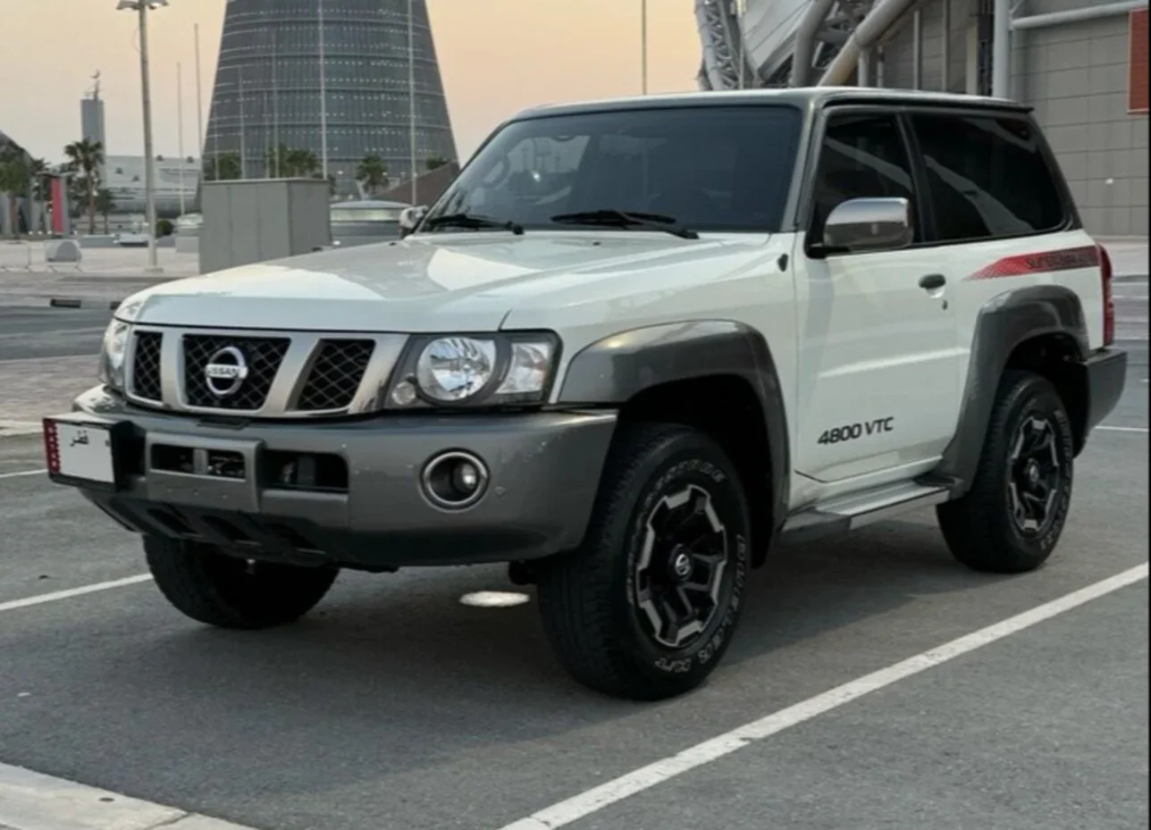 Nissan  Patrol  Super Safari  2021  Manual  104,000 Km  6 Cylinder  Four Wheel Drive (4WD)  SUV  White and Silver