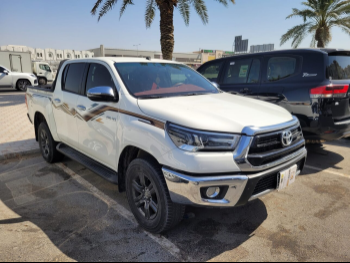 Toyota  Hilux  2024  Automatic  51,000 Km  4 Cylinder  Four Wheel Drive (4WD)  Pick Up  White  With Warranty