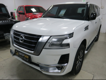 Nissan  Patrol  XE  2020  Automatic  210,000 Km  6 Cylinder  Four Wheel Drive (4WD)  SUV  White