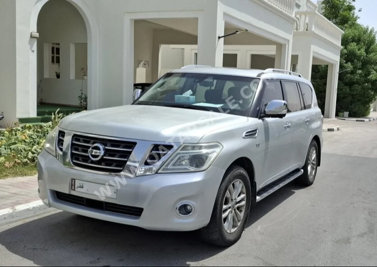 Nissan  Patrol  LE  2013  Automatic  215,000 Km  8 Cylinder  Four Wheel Drive (4WD)  SUV  Silver Matte