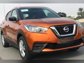 Nissan  Kicks  4 Cylinder  SUV ( AWD )  Orange  2020