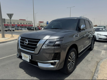 Nissan  Patrol  Platinum  2021  Automatic  26,000 Km  6 Cylinder  Four Wheel Drive (4WD)  SUV  Gray  With Warranty