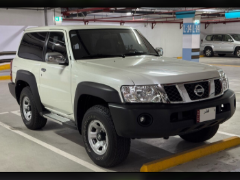 Nissan  Patrol  GL  2022  Manual  15,000 Km  6 Cylinder  Four Wheel Drive (4WD)  SUV  White  With Warranty