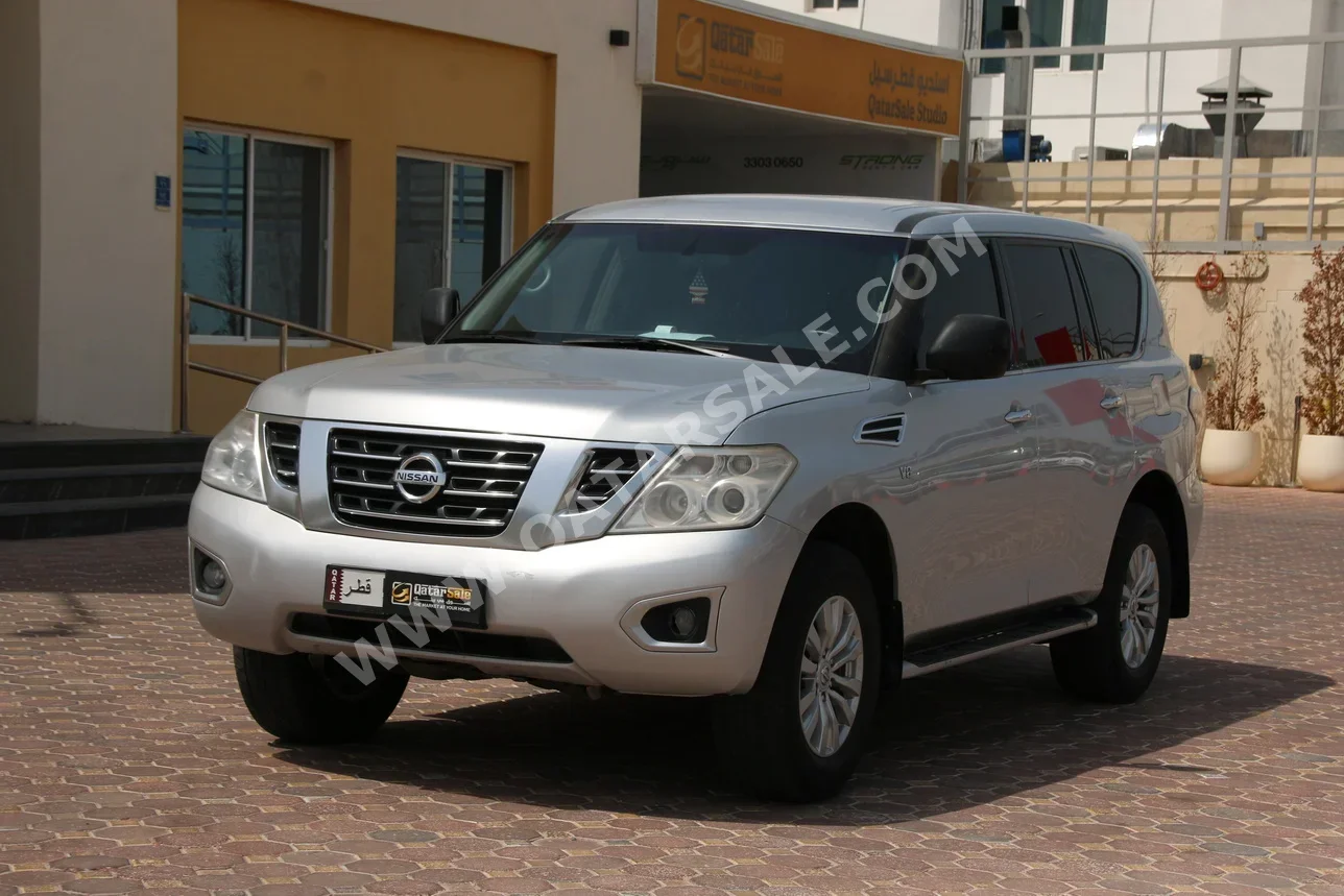 Nissan  Patrol  XE  2014  Automatic  352,000 Km  8 Cylinder  Four Wheel Drive (4WD)  SUV  Silver