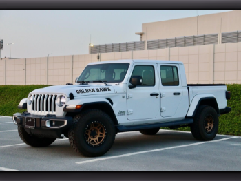 Jeep  Gladiator  Overland  2021  Automatic  57,000 Km  6 Cylinder  Four Wheel Drive (4WD)  Pick Up  White