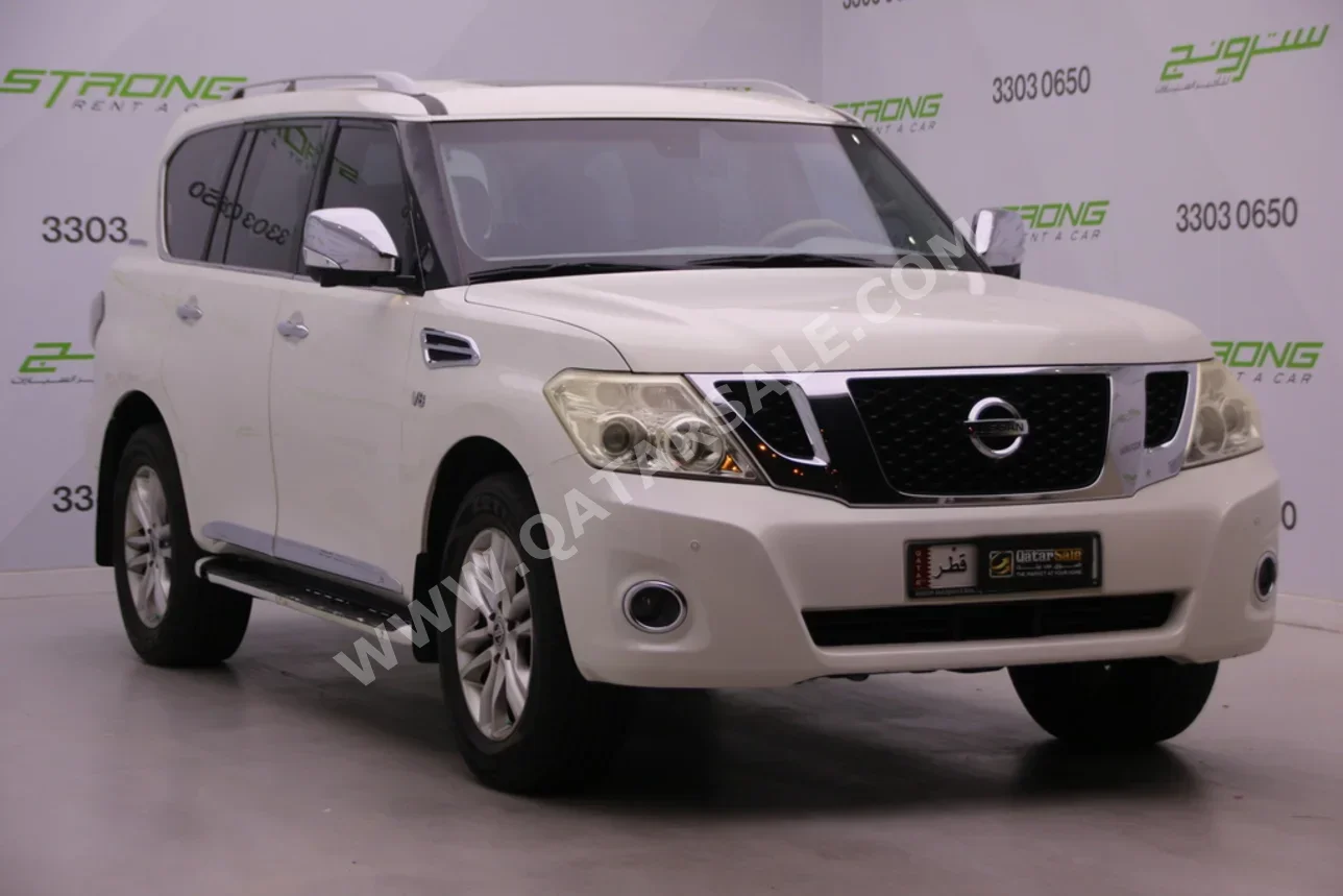 Nissan  Patrol  LE  2012  Automatic  209,000 Km  8 Cylinder  Four Wheel Drive (4WD)  SUV  White