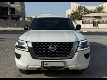 Nissan  Patrol  XE  2022  Automatic  57,000 Km  6 Cylinder  Four Wheel Drive (4WD)  SUV  White  With Warranty