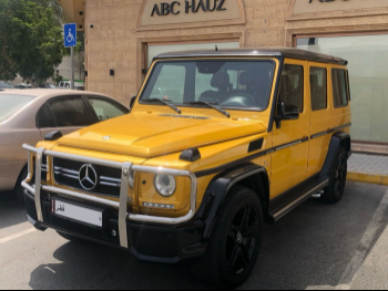 Mercedes-Benz  G-Class  63 AMG  2015  Automatic  128,000 Km  8 Cylinder  Four Wheel Drive (4WD)  SUV  Yellow