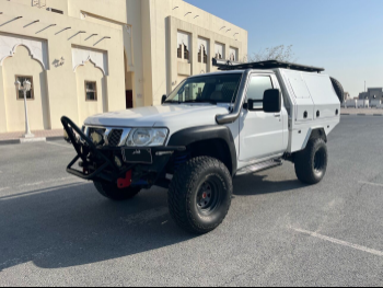 Nissan  Patrol  Pickup  2013  Manual  139,000 Km  6 Cylinder  Four Wheel Drive (4WD)  Pick Up  White