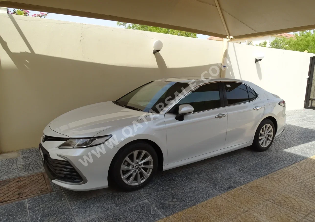 Toyota  Camry  GLE  2021  Automatic  6,000 Km  4 Cylinder  Front Wheel Drive (FWD)  Sedan  White  With Warranty