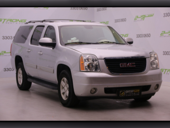 GMC  Yukon  XL  2013  Automatic  223,000 Km  8 Cylinder  Four Wheel Drive (4WD)  SUV  Gold