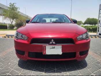 Mitsubishi  Lancer  EX  2015  Automatic  161,000 Km  4 Cylinder  Front Wheel Drive (FWD)  Sedan  Maroon