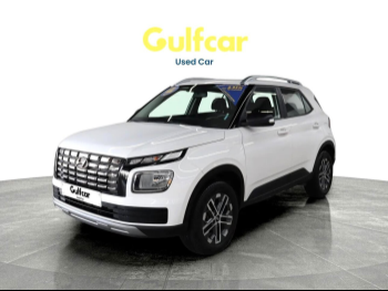 Hyundai  Venue  2024  Automatic  30,360 Km  3 Cylinder  Front Wheel Drive (FWD)  SUV  White  With Warranty
