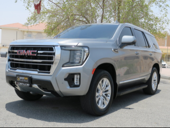 GMC  Yukon  SLT  2023  Automatic  60,000 Km  8 Cylinder  Four Wheel Drive (4WD)  SUV  Gray  With Warranty