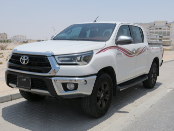 Toyota  Hilux  2021  Automatic  151,000 Km  4 Cylinder  Four Wheel Drive (4WD)  Pick Up  White
