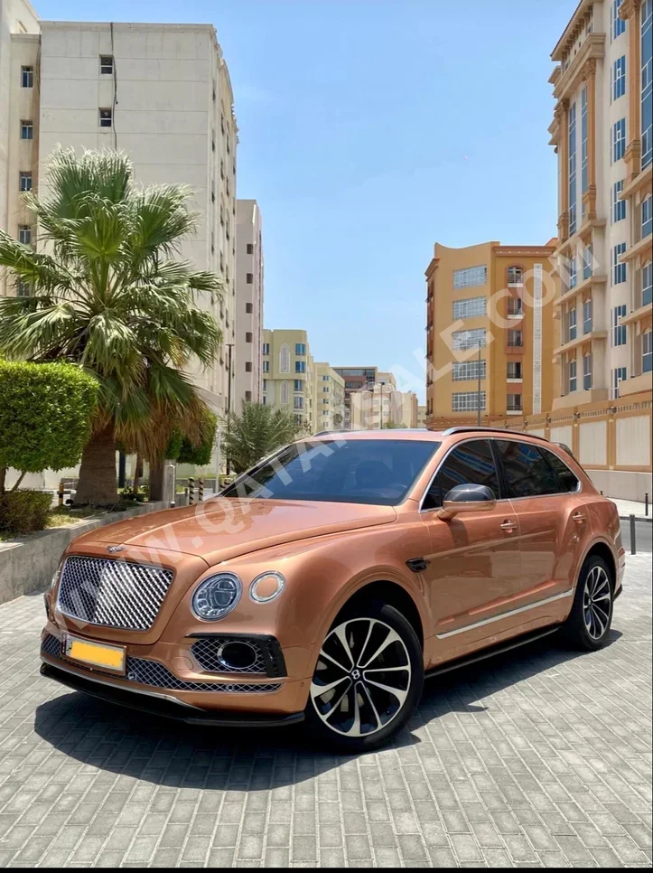 Bentley  Bentayga  2018  Automatic  81,000 Km  12 Cylinder  Four Wheel Drive (4WD)  SUV  Gold