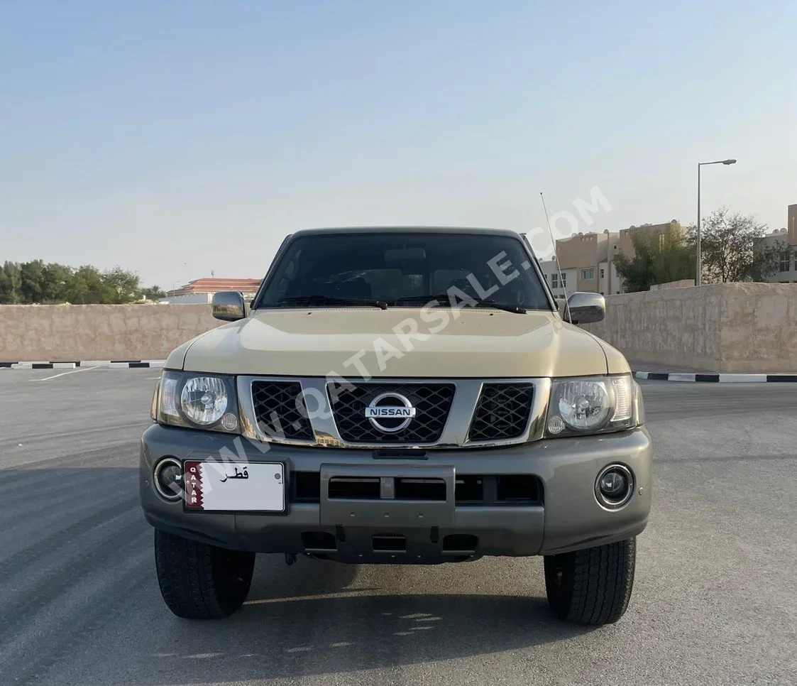 Nissan  Patrol  Super Safari  2023  Automatic  33,000 Km  6 Cylinder  Four Wheel Drive (4WD)  SUV  Beige  With Warranty