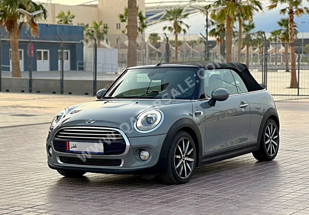 Mini  Cooper  2016  Automatic  106,000 Km  3 Cylinder  Front Wheel Drive (FWD)  Convertible  Gray Nardo