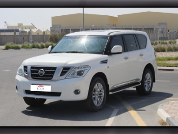 Nissan  Patrol  LE  2013  Automatic  249,000 Km  8 Cylinder  Four Wheel Drive (4WD)  SUV  White