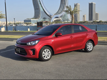 Kia  Pegas  4 Cylinder  Sedan  Red  2025