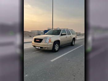 GMC  Yukon  XL  2012  Automatic  259,000 Km  8 Cylinder  Four Wheel Drive (4WD)  SUV  Gold