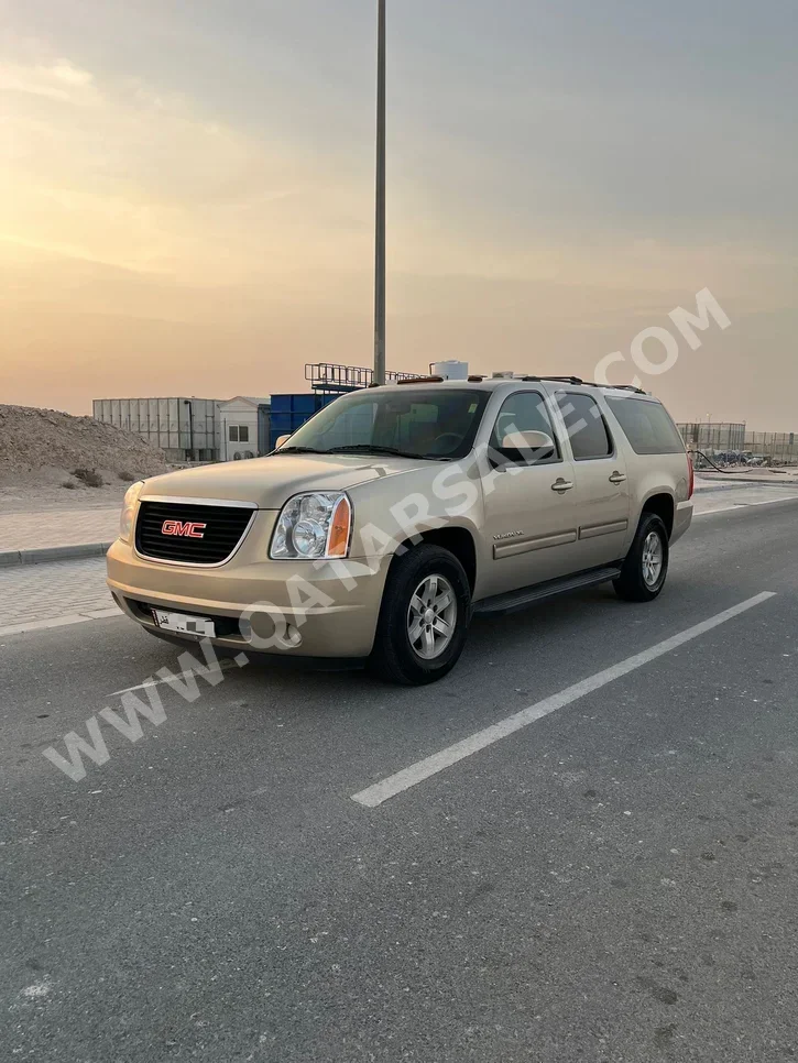 GMC  Yukon  XL  2012  Automatic  259,000 Km  8 Cylinder  Four Wheel Drive (4WD)  SUV  Gold