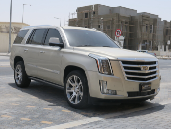 Cadillac  Escalade  2015  Automatic  258,000 Km  8 Cylinder  Four Wheel Drive (4WD)  SUV  Gold