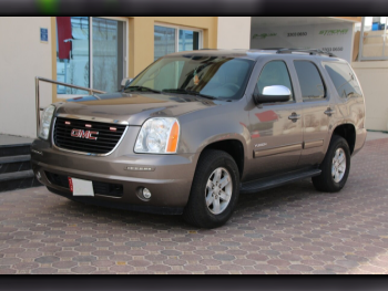 GMC  Yukon  2012  Automatic  206,000 Km  8 Cylinder  Four Wheel Drive (4WD)  SUV  Bronze