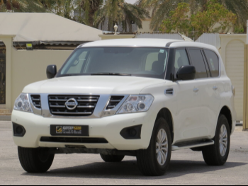 Nissan  Patrol  XE  2019  Automatic  92,600 Km  6 Cylinder  Four Wheel Drive (4WD)  SUV  White