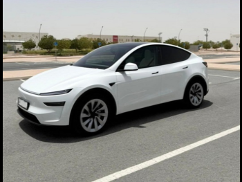 Tesla  Model Y  2025  Automatic  1,000 Km  0 Cylinder  Rear Wheel Drive (RWD)  Sedan  White  With Warranty