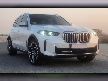 BMW  X-Series  X5 40i  2024  Automatic  1,900 Km  6 Cylinder  Four Wheel Drive (4WD)  SUV  White  With Warranty