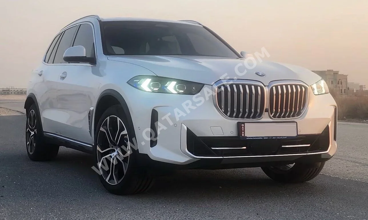 BMW  X-Series  X5 40i  2024  Automatic  1,900 Km  6 Cylinder  Four Wheel Drive (4WD)  SUV  White  With Warranty