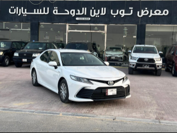 تويوتا  كامري  أل اي  2021  اوتوماتيك  264,000 كم  4 سلندر  سحب امامي  سيدان  أبيض