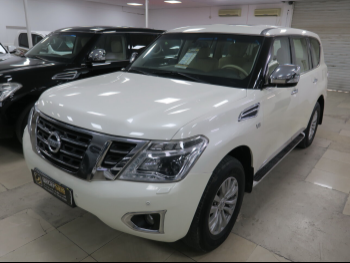 Nissan  Patrol  SE  2014  Automatic  451,000 Km  8 Cylinder  Four Wheel Drive (4WD)  SUV  White