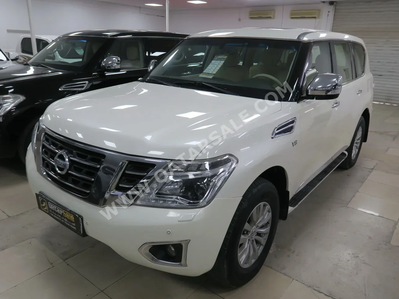 Nissan  Patrol  SE  2014  Automatic  451,000 Km  8 Cylinder  Four Wheel Drive (4WD)  SUV  White