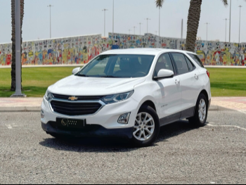 Chevrolet  Equinox  2019  Automatic  87,000 Km  4 Cylinder  Front Wheel Drive (FWD)  SUV  White
