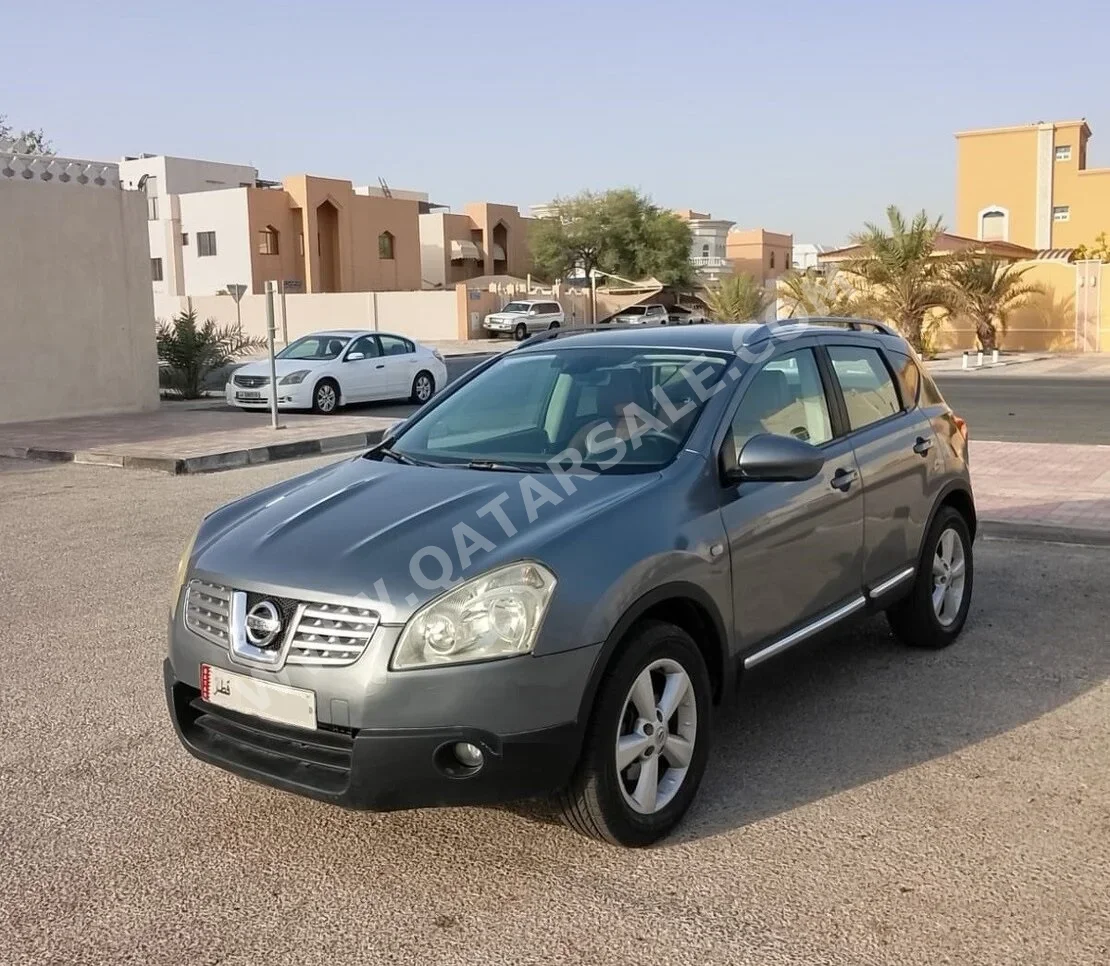 Nissan  Qashqai  LE  2009  Automatic  210,000 Km  4 Cylinder  All Wheel Drive (AWD)  Hatchback  Gray