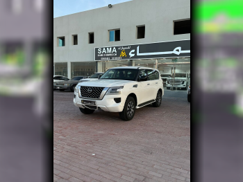 Nissan  Patrol  XE  2024  Automatic  157,000 Km  6 Cylinder  Four Wheel Drive (4WD)  SUV  White