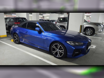 BMW  4-Series  420 I  2023  Automatic  21,000 Km  4 Cylinder  Rear Wheel Drive (RWD)  Convertible  Blue  With Warranty