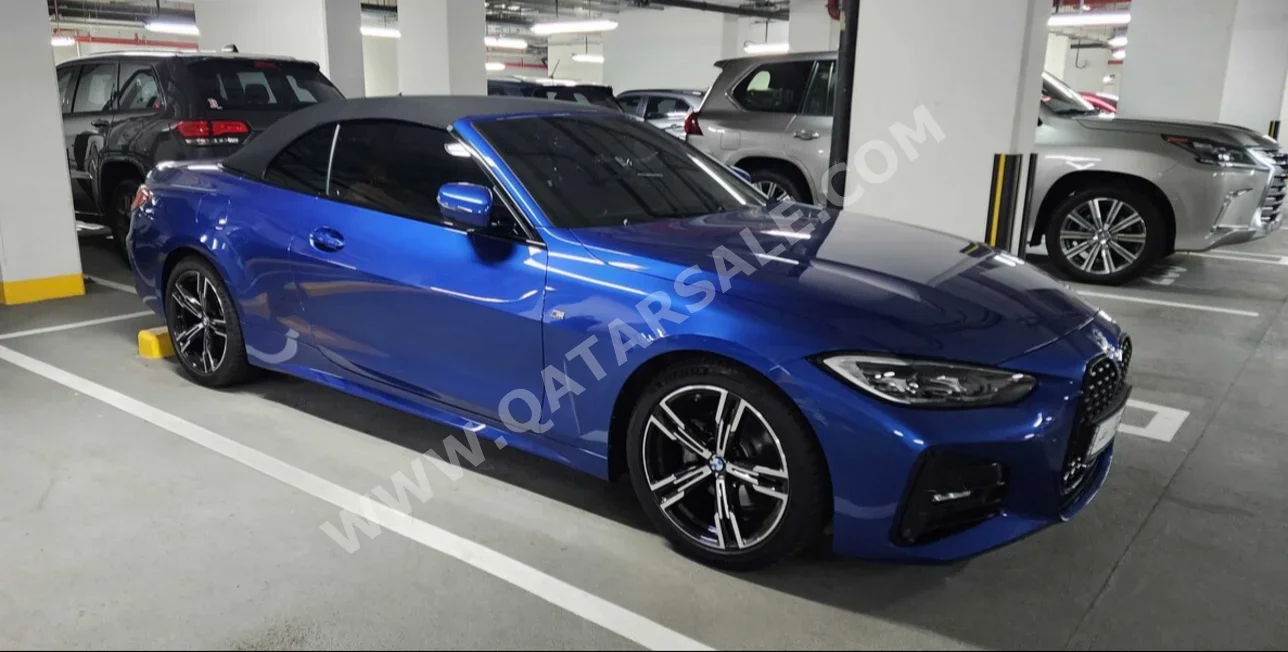 BMW  4-Series  420 I  2023  Automatic  21,000 Km  4 Cylinder  Rear Wheel Drive (RWD)  Convertible  Blue  With Warranty