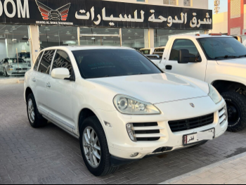بورش  كيان  اس  2006  اوتوماتيك  230,000 كم  6 سلندر  دفع رباعي  اس يو في  أبيض