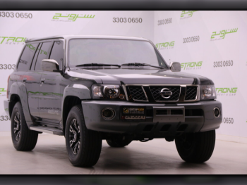 Nissan  Patrol  Super Safari  2024  Manual  76,000 Km  6 Cylinder  Four Wheel Drive (4WD)  SUV  Black and Gray  With Warranty