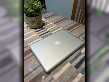 Laptops Apple  - MacBook Pro 13 Inch  2012  - Silver  - MacOS  - Intel  - Core i5 dual core  -Memory (Ram): 8 GB
