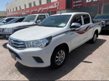 Toyota  Hilux  2019  Automatic  128,000 Km  4 Cylinder  Rear Wheel Drive (RWD)  Pick Up  White