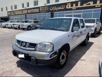 Nissan  Pickup  2013  Manual  99,000 Km  4 Cylinder  Rear Wheel Drive (RWD)  Pick Up  White