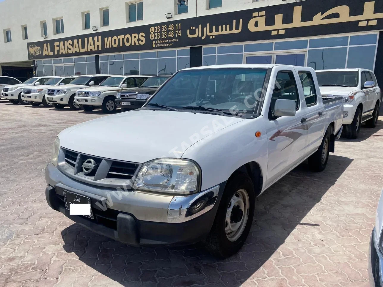 Nissan  Pickup  2013  Manual  99,000 Km  4 Cylinder  Rear Wheel Drive (RWD)  Pick Up  White