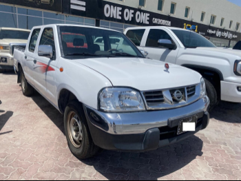 Nissan  Pickup  2016  Manual  295,000 Km  4 Cylinder  Rear Wheel Drive (RWD)  Pick Up  White